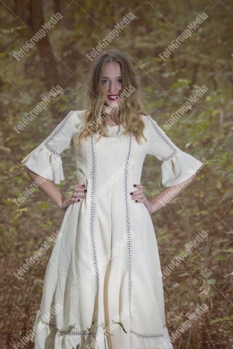 Young woman posing in a vintage dress