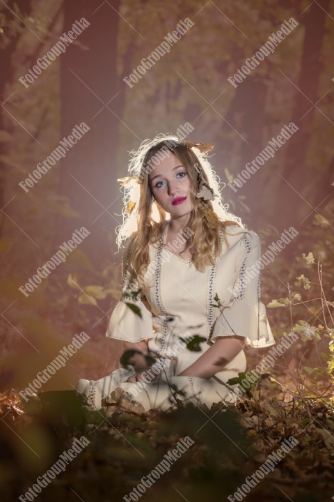 Romantic portrait of a girl in autumn decor