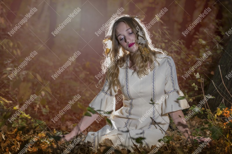 Romantic portrait of a girl in autumn decor