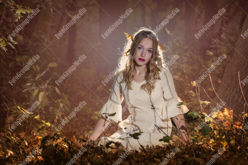 Romantic portrait of a girl in autumn decor