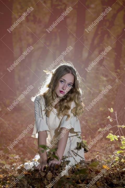 Romantic portrait of a girl in autumn decor