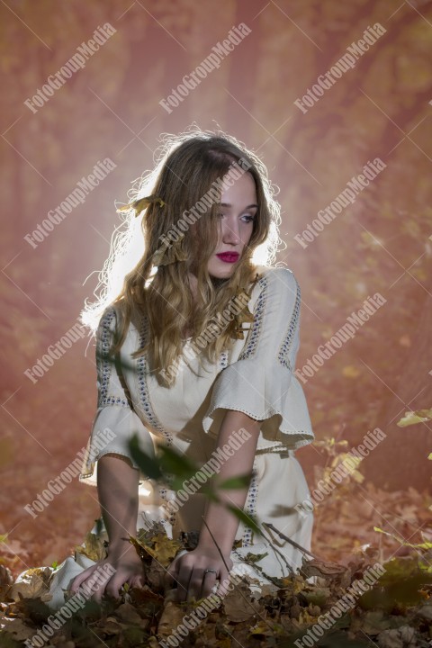 Romantic portrait of a girl in autumn decor