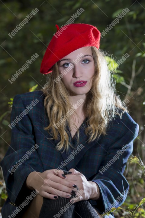 Young woman with red berette