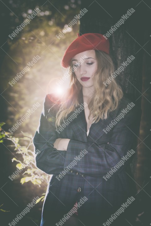 Romantic portrait of a girl in the park, autumn decor