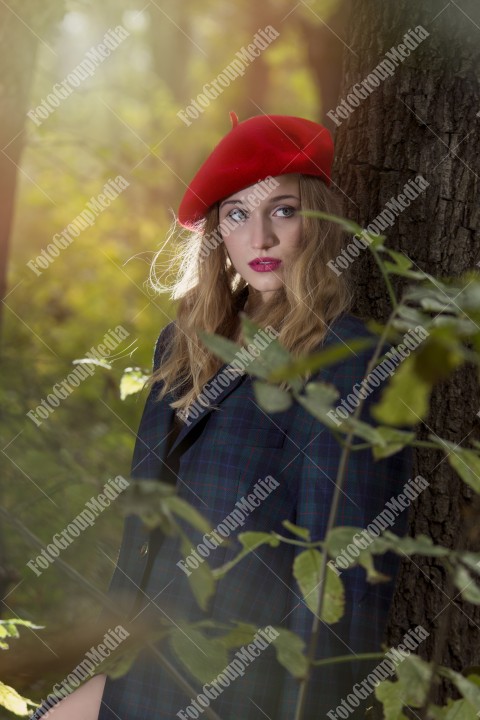 Woman with red berette close up portrait