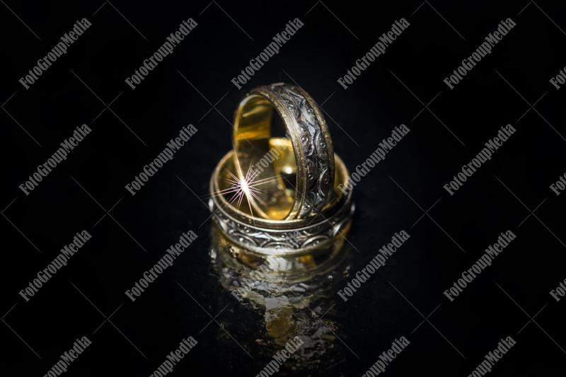 Wedding rings isolated on black background