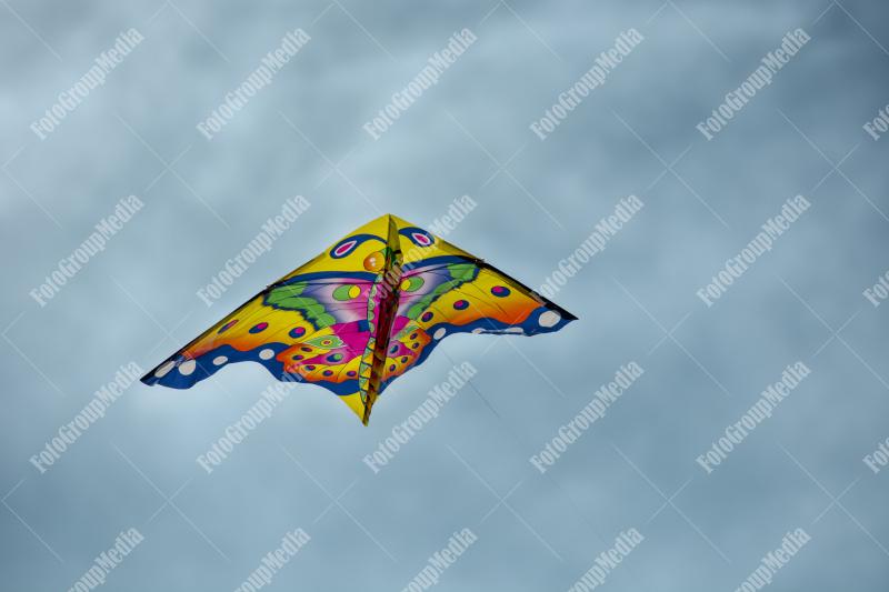 Kite flying on blue sky