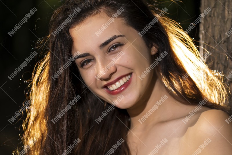 Art portrait of a smiling young woman