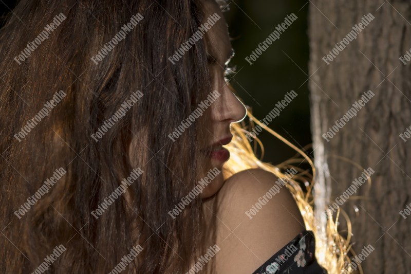 Hiding her beautiful face behind hair