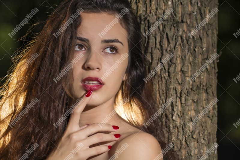 Romantic outdoor portrait of a young woman