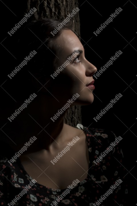 Romantic outdoor portrait of a young woman
