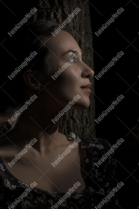 Romantic outdoor portrait of a young woman