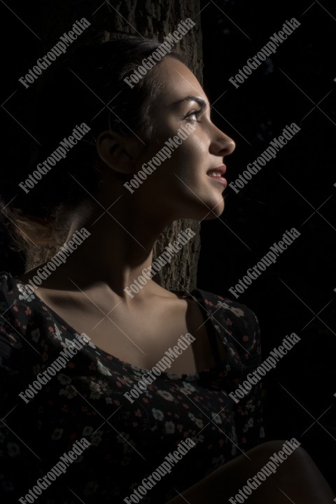 Romantic outdoor portrait of a young woman