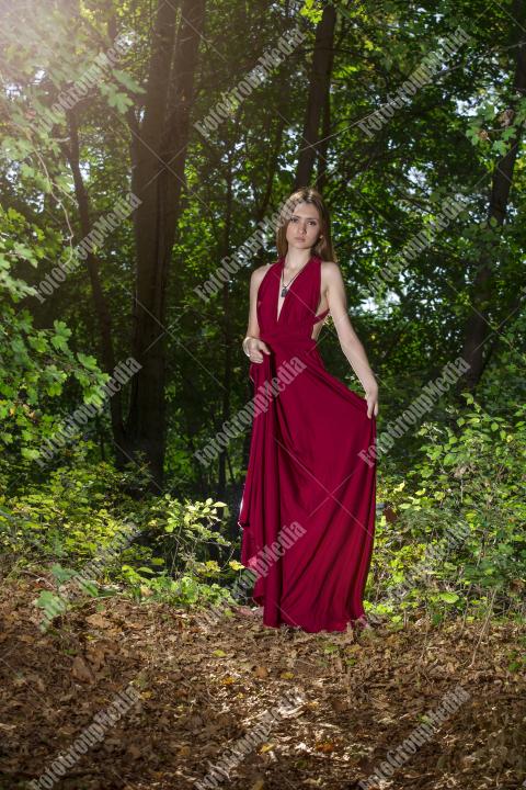 Perfect outfit for a young woman posing on forest background