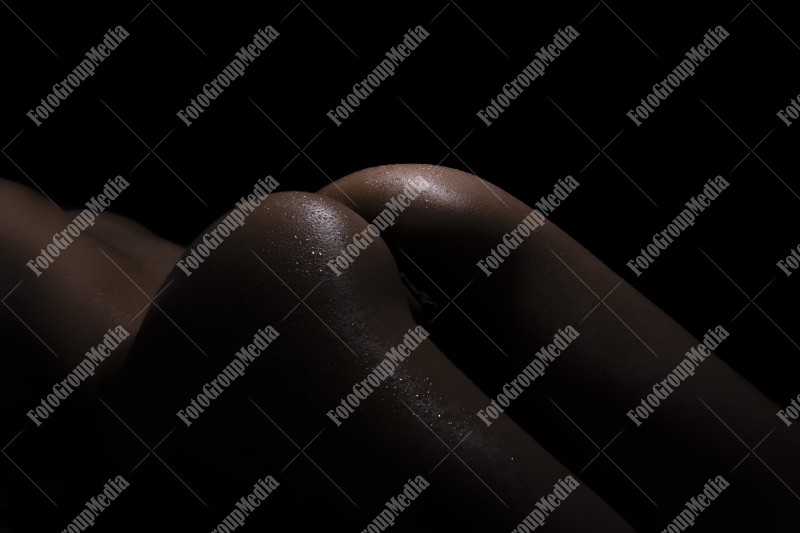 Fine art bodyscape of a nude woman's bottocks