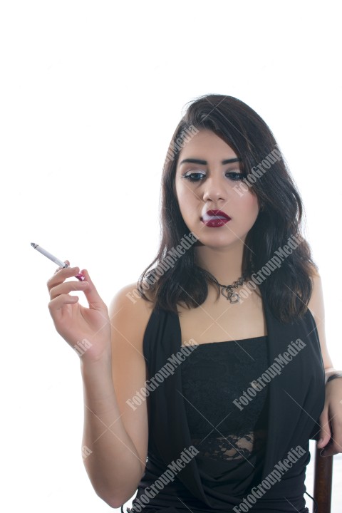 Studio shoot, brunette young woman dressed in black