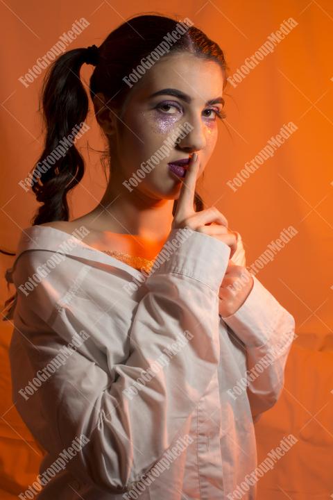 Portrait of a young girl with artistic make up