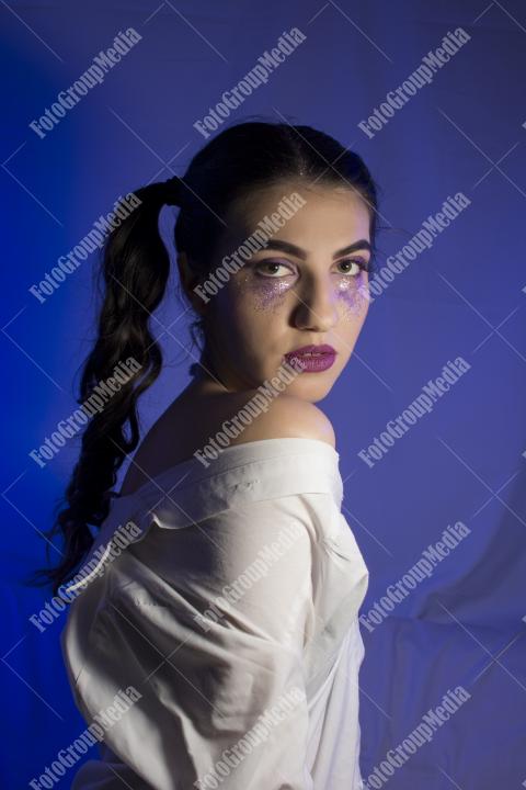 A deep-in-thought portrait of a young woman