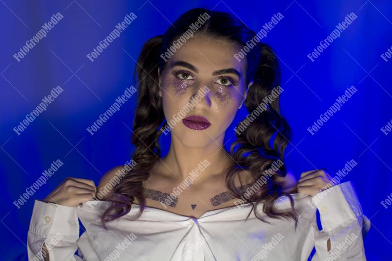 A deep-in-thought portrait of a young woman