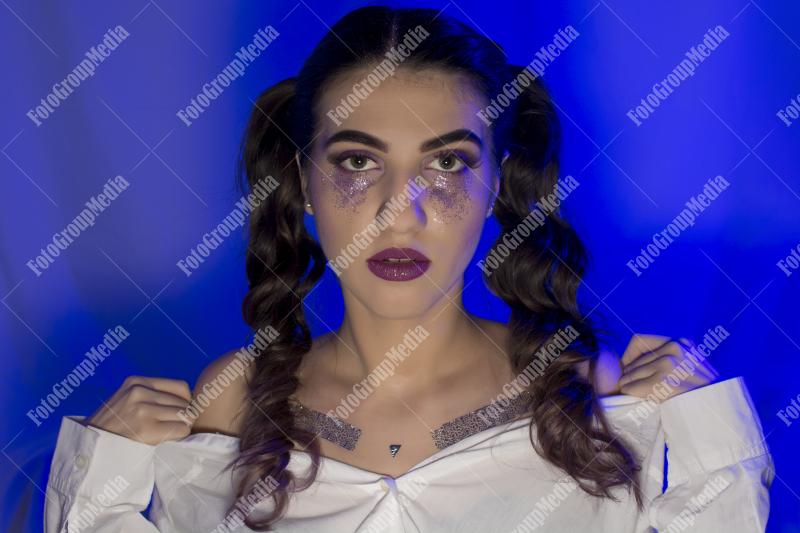 A deep-in-thought portrait of a young woman