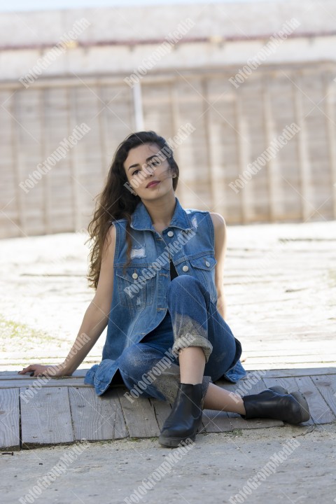 Happy woman enjoying a summer day at the beach