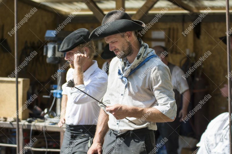 Journeymen working in courtyard of The Lutheran Cathedral of Saint Mary from Sibiu, Transylvania