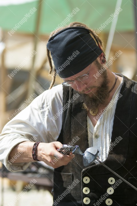 Journeymen working in courtyard of The Lutheran Cathedral of Saint Mary from Sibiu, Transylvania