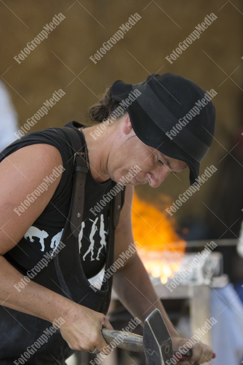 Journeymen working in courtyard of The Lutheran Cathedral of Saint Mary from Sibiu, Transylvania