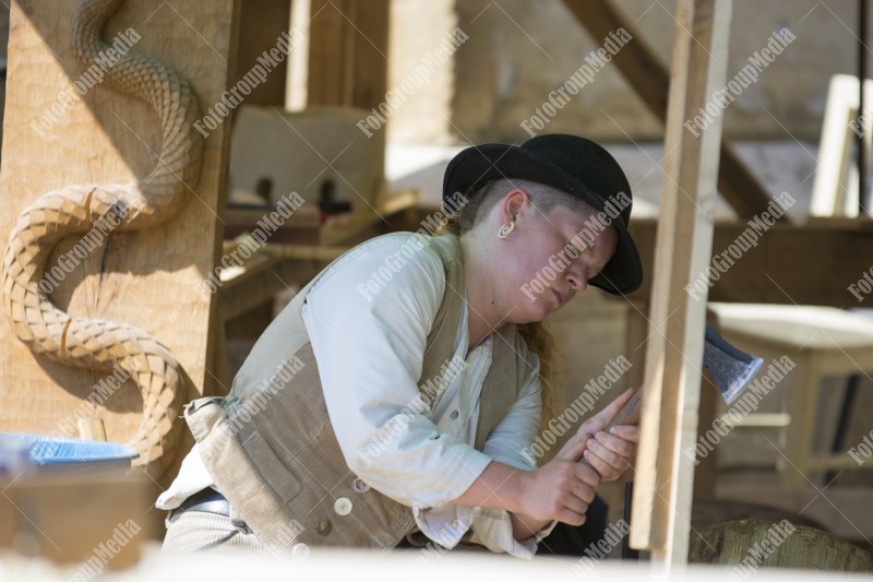 Journeymen working in courtyard of The Lutheran Cathedral of Saint Mary from Sibiu, Transylvania