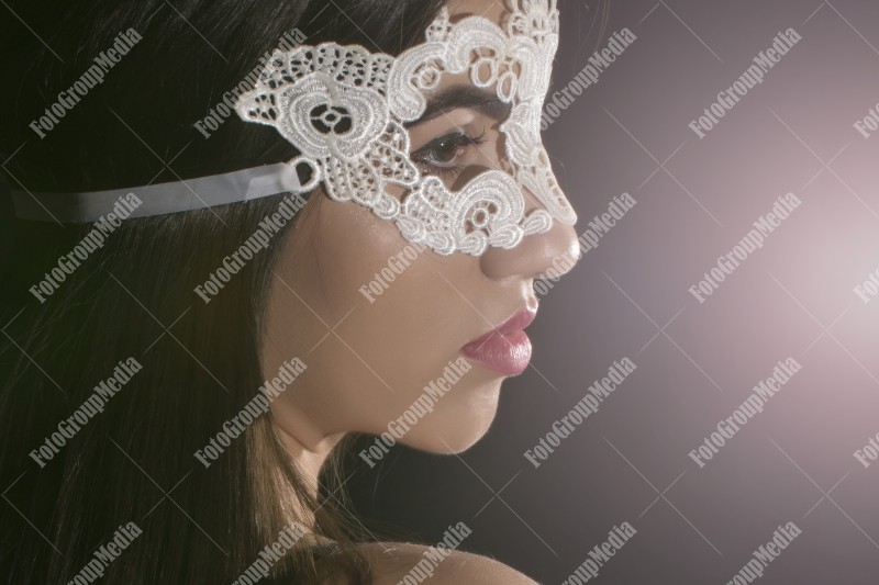 Hiding behind lace mask