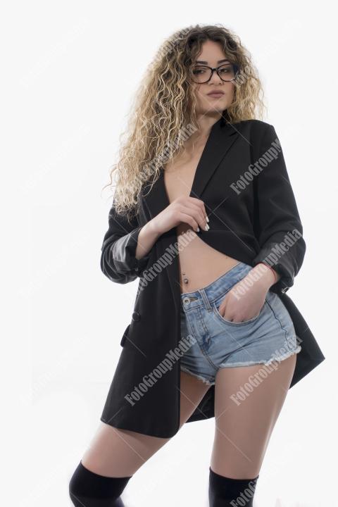 Brave and confident woman posing in studio.