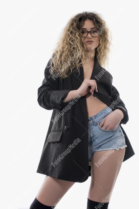 Brave and confident woman posing in studio.