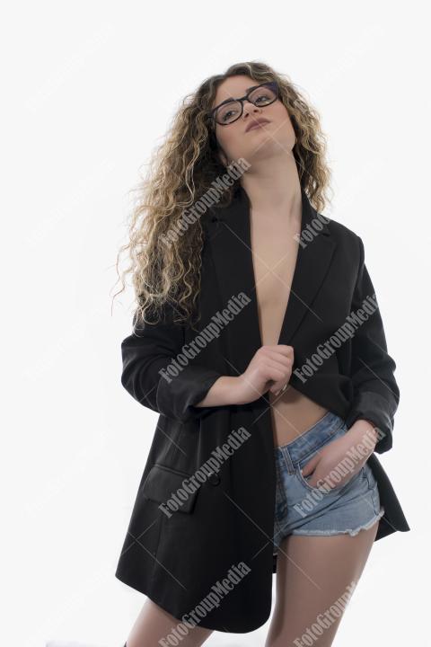 Brave and confident woman posing in studio.