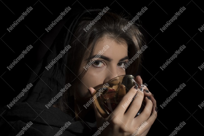 Girl drinking tea, studio shoot