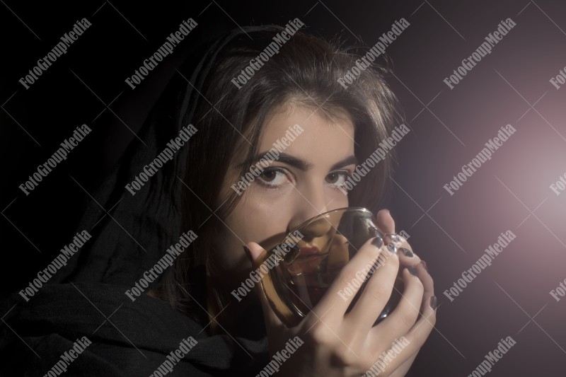 Girl drinking tea, studio shoot