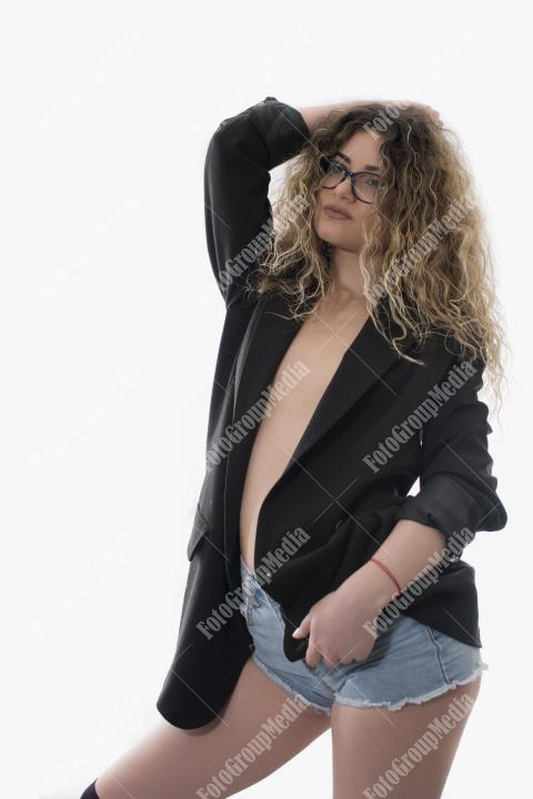 Brave and confident woman posing in studio.