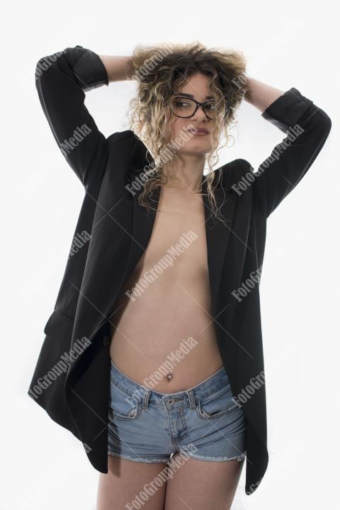 Beautiful blonde woman posing on white background