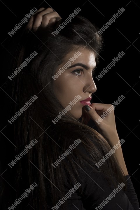 Close-up portrait of a young brunette woman