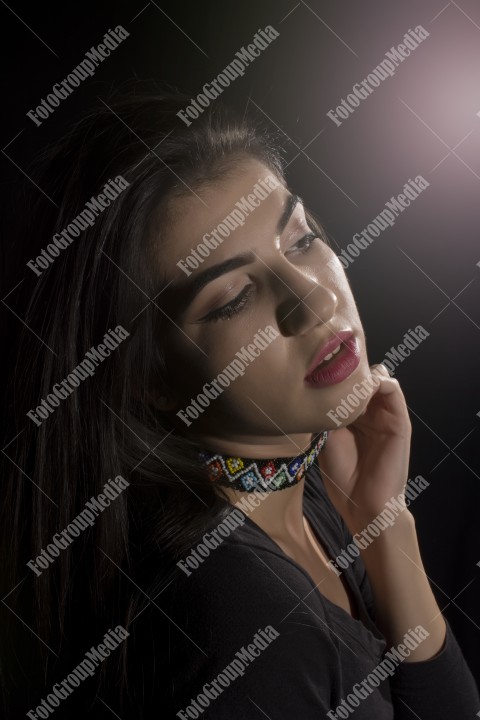 Close-up portrait of a young brunette woman
