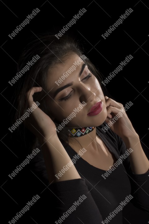 Close-up portrait of a young brunette woman