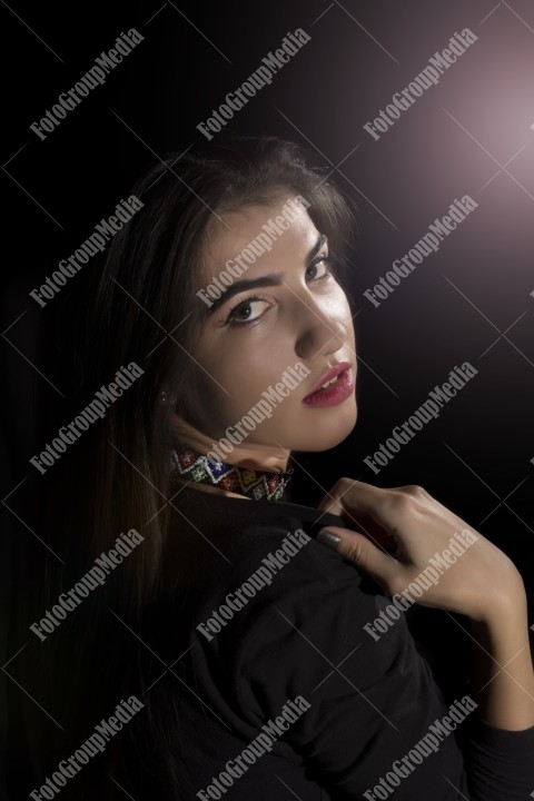 Close-up portrait of a young brunette woman