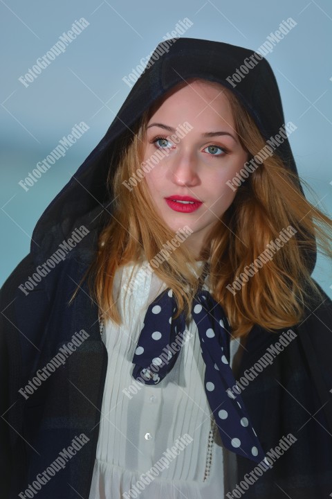 Blue eyes woman close up portrait