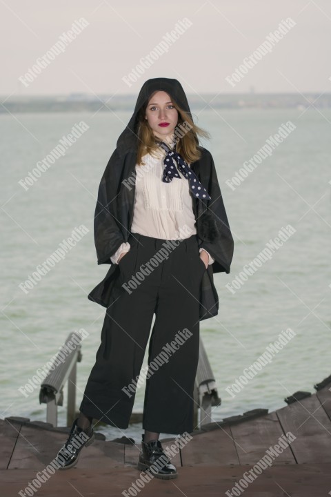 Modelling outfit for camera on pier