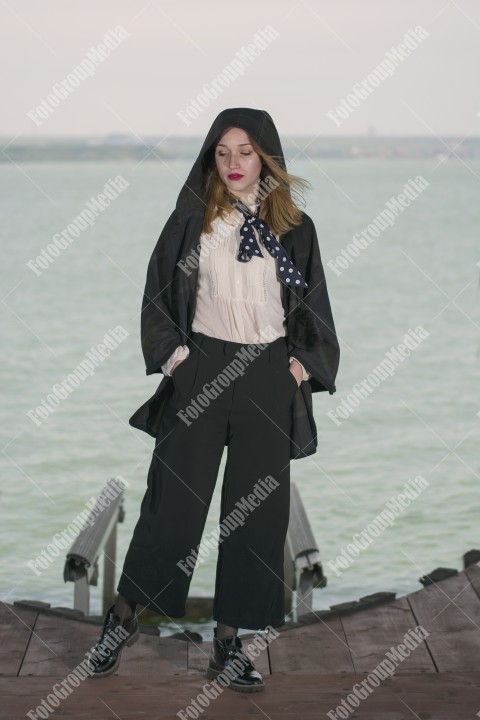 Modelling outfit for camera on pier