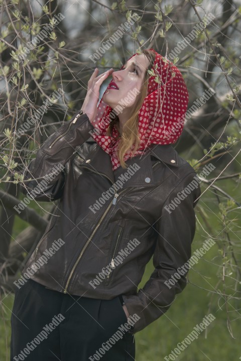 Blue eyes girl with red scarf posing for camera