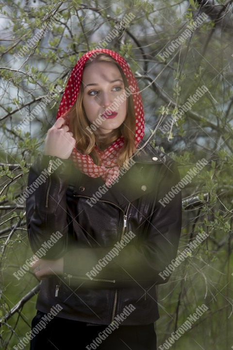 Blue eyes girl with red scarf posing for camera