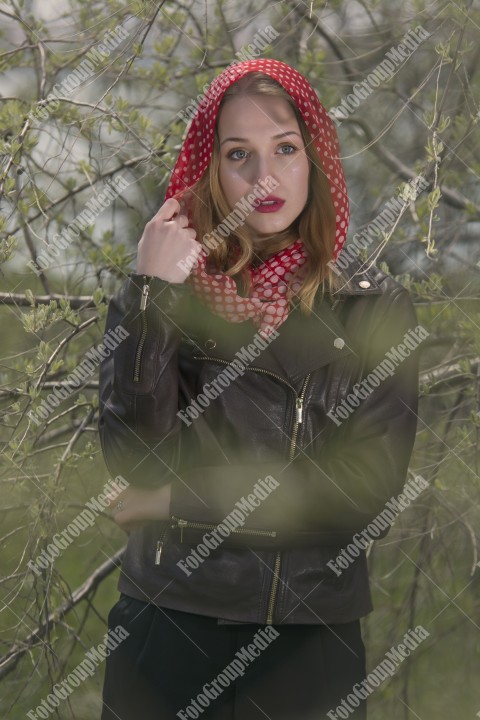 Blue eyes girl with red scarf posing for camera