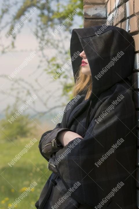 Enjoying the sun under a big hood