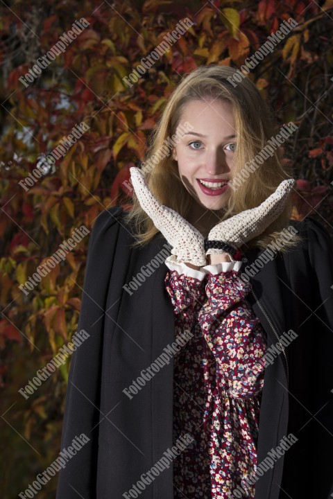 Outdoor portrait using colorful leafs as background