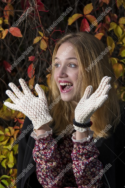 Outdoor portrait using colorful leafs as background